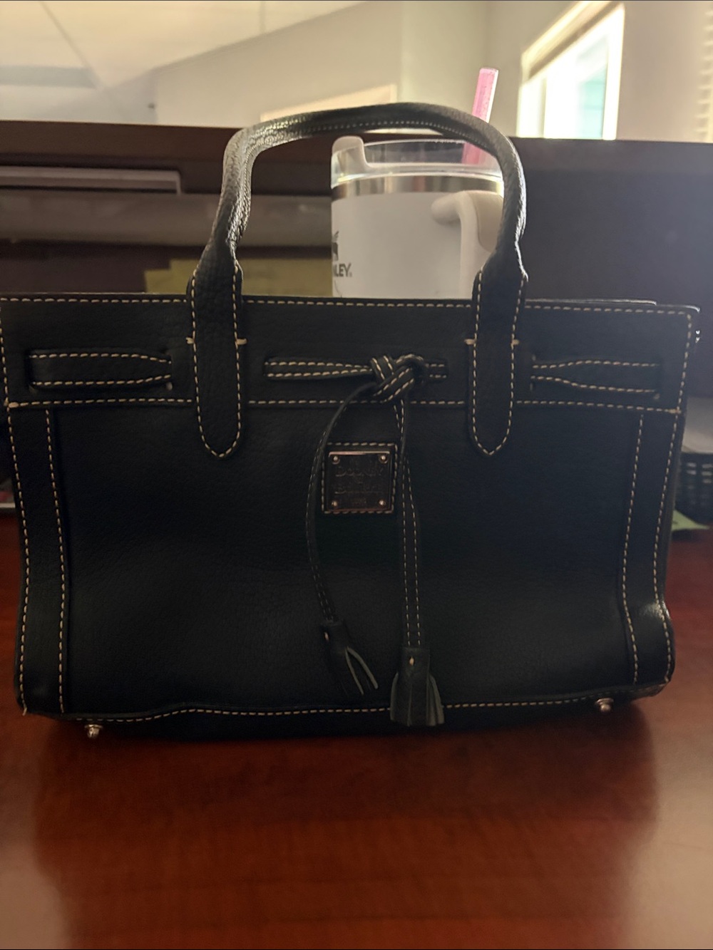 Dooney & Bourke Black Leather Satchel with White Stitching and Tassel